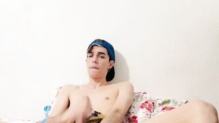 Sexy twink Henry Evans roughly strokes his huge schlong giving shivers
