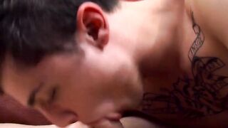 Tatted stud Chris Porter takes a sexy footjob from hot Bryce Corbin