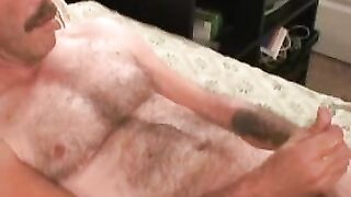 Old amateur with mustache masturbates his limp dick and cums