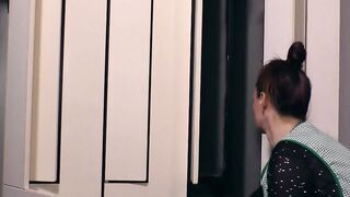 Petite cleaning lady pushes a cone inside herself