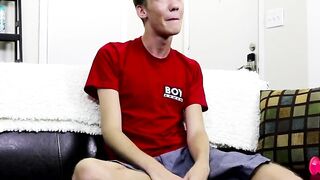 Twink laying alone and stroking cock before using toy