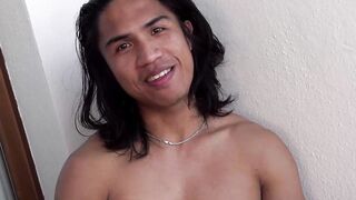 Adorable Phillipine jock tugs his throbbing cock during an interview