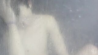 Tugging on his wet cock and moaning in the shower all alone