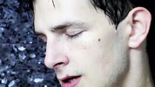Tugging on his wet cock and moaning in the shower all alone