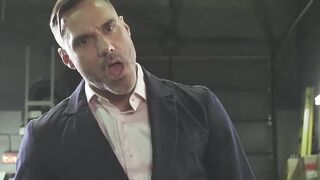 Dominant car mechanic subdues handsome hunk for feet worship