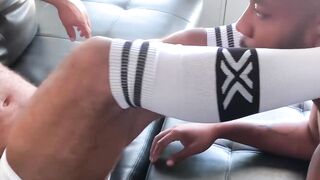 Dominant black hunk foot worshipped by his kinky hung buddy