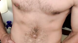 Hunter is in the bathroom teasing us by stroking his cock