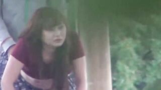 Voyeur records Japanese chick fucking and blowing outside