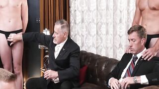 Hot stud Clayton Foster rides the big dick of suited daddy Legrand Wolf in a group se