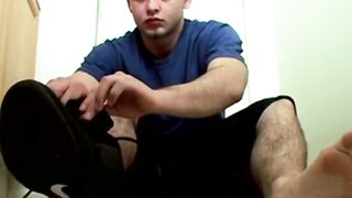 Sporty straight guy Cage jacks his stiff shaft until he shoots his hot load