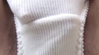 Cute girl from Japan massages her hairy pussy until orgasm
