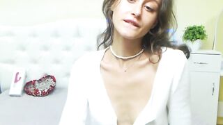 Small tits babe AlesyaDron in blouse masturbates on solo webcam show