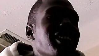Ebony amateur watches porn and tugs on his big black cock