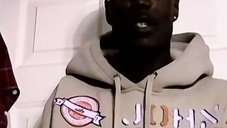 Ebony amateur watches porn and tugs on his big black cock