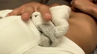 Straight boy Wiley kicking back and playing with his growing bulge in his shorts