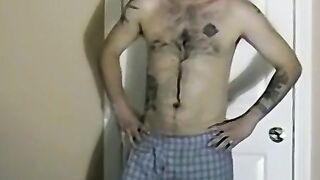 Tattooed amateur with glasses masturbates solo and cums