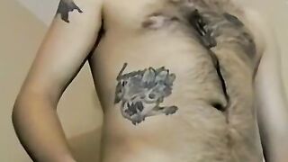 Tattooed amateur with glasses masturbates solo and cums
