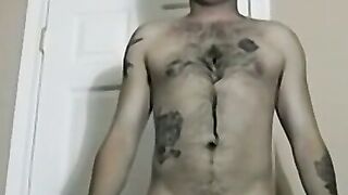 Tattooed amateur with glasses masturbates solo and cums