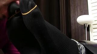 Tied up businessman endures feet tickling and toe sucking