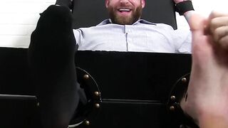 Buff hunk gets tied up while another man worships his feet