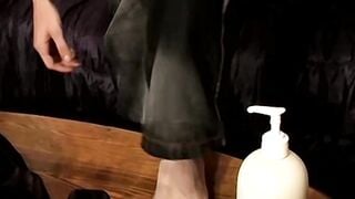 Big dick Wiley has his cum dribbling down those soles after wanking