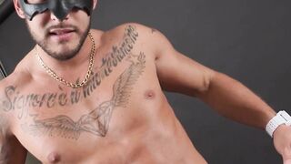 Muscular masked hunk jerks off his big erect cock solo