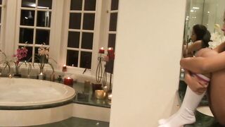 Sexsual lesbians masturbating inside bath-tub tube