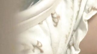 Cute Asian babe filmed by horny voyeur during masturbation