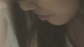 Cute Asian babe filmed by horny voyeur during masturbation