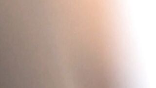 Cute Asian babe filmed by horny voyeur during masturbation