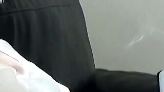 Blonde twink revealed his cock while blowing smoke