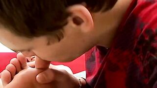 Handsome Alex Page licks and sucks his buddy toes while foot wanking