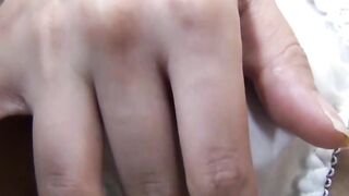 Cute Japanese fingering herself and climaxing