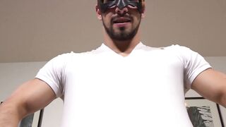 Masked muscular gay receives blowjob and handjob from Pascal