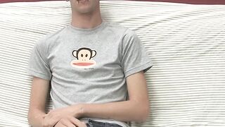 Adorable gay guy Danny jerks off his dick on couch solo