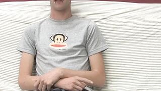 Adorable gay guy Danny jerks off his dick on couch solo