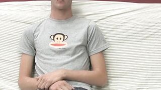 Adorable gay guy Danny jerks off his dick on couch solo