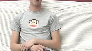 Adorable gay guy Danny jerks off his dick on couch solo