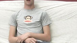 Adorable gay guy Danny jerks off his dick on couch solo