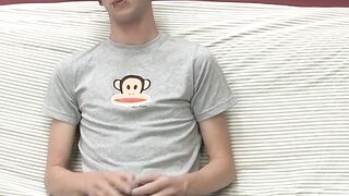 Adorable gay guy Danny jerks off his dick on couch solo