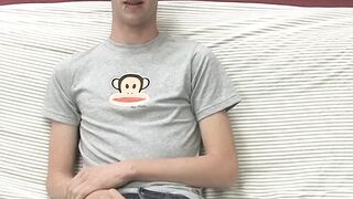 Adorable gay guy Danny jerks off his dick on couch solo