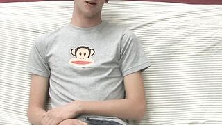 Adorable gay guy Danny jerks off his dick on couch solo