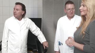 Blonde bimbo gets inspected by 2 doctors