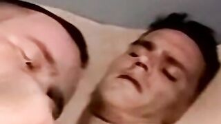 Amateur jerks off while mature man helps him cum with tongue