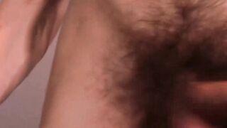 Playful hottie Troy solo masturbates his girthy penis and bouncy pair of balls