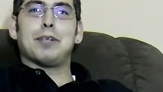 Nerdy amateur with glasses strips to jerk off until he cums
