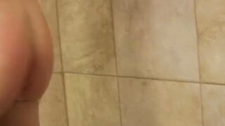 Redhead twink Alan Parish masturbates and cums under shower