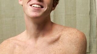 Redhead twink Alan Parish masturbates and cums under shower