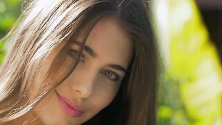 Sexy and attractive lass Katrine Pirs exhibiting her body in the garden
