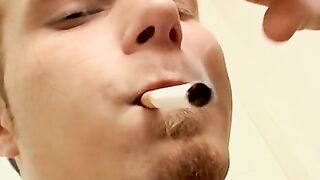 Cute skater Billy Da Kidd smokes multiple cigs while stroking his big cockÂ 
